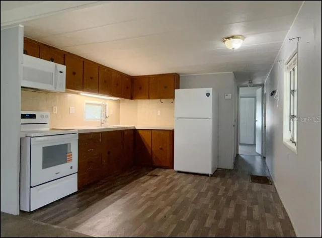 a view of a bathroom from a hallway