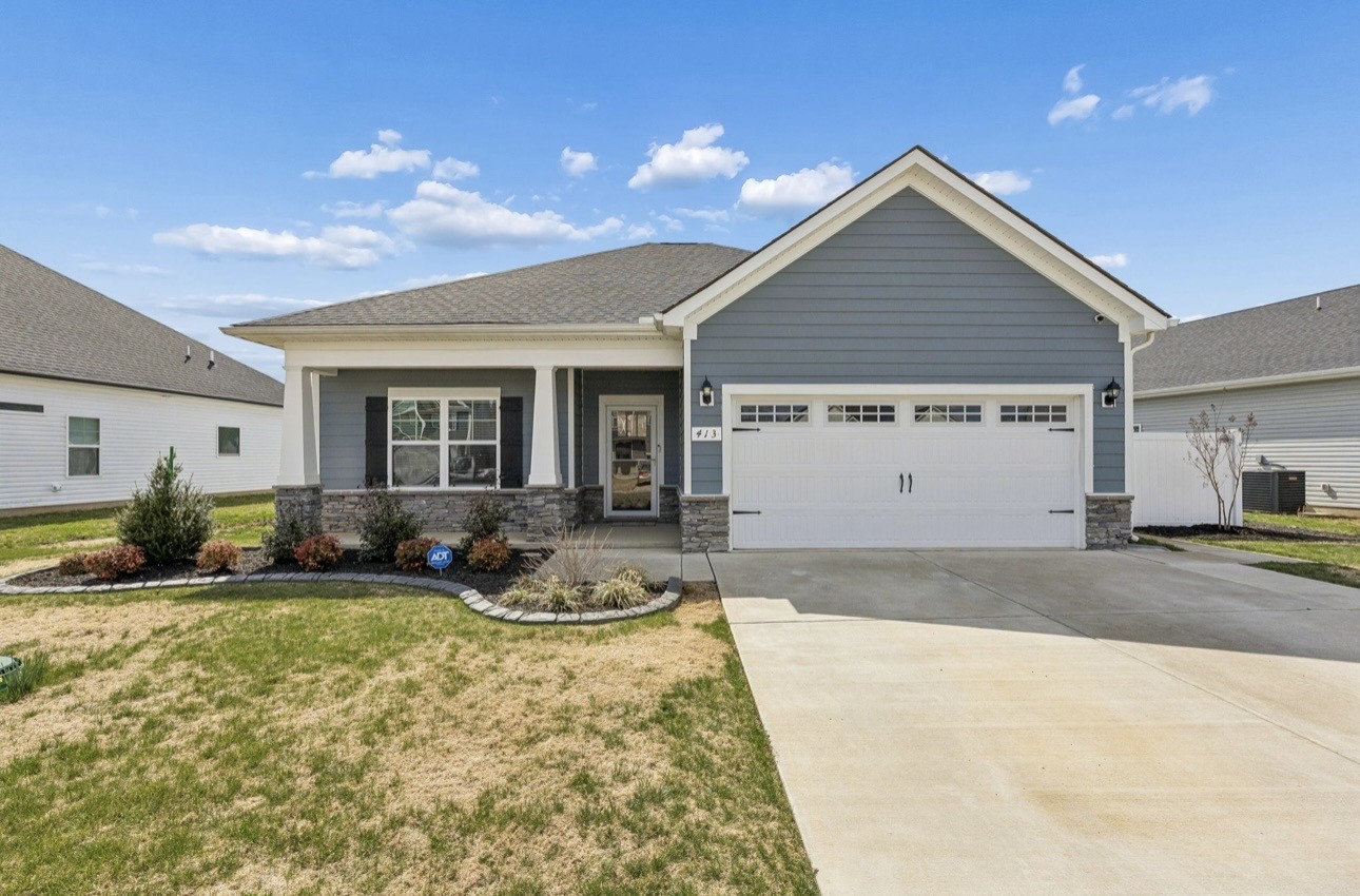413 Ruby Cate Way Murfreesboro, TN 37128 - Photo 1 of 31 a front view of a house with a yard and outdoor seating