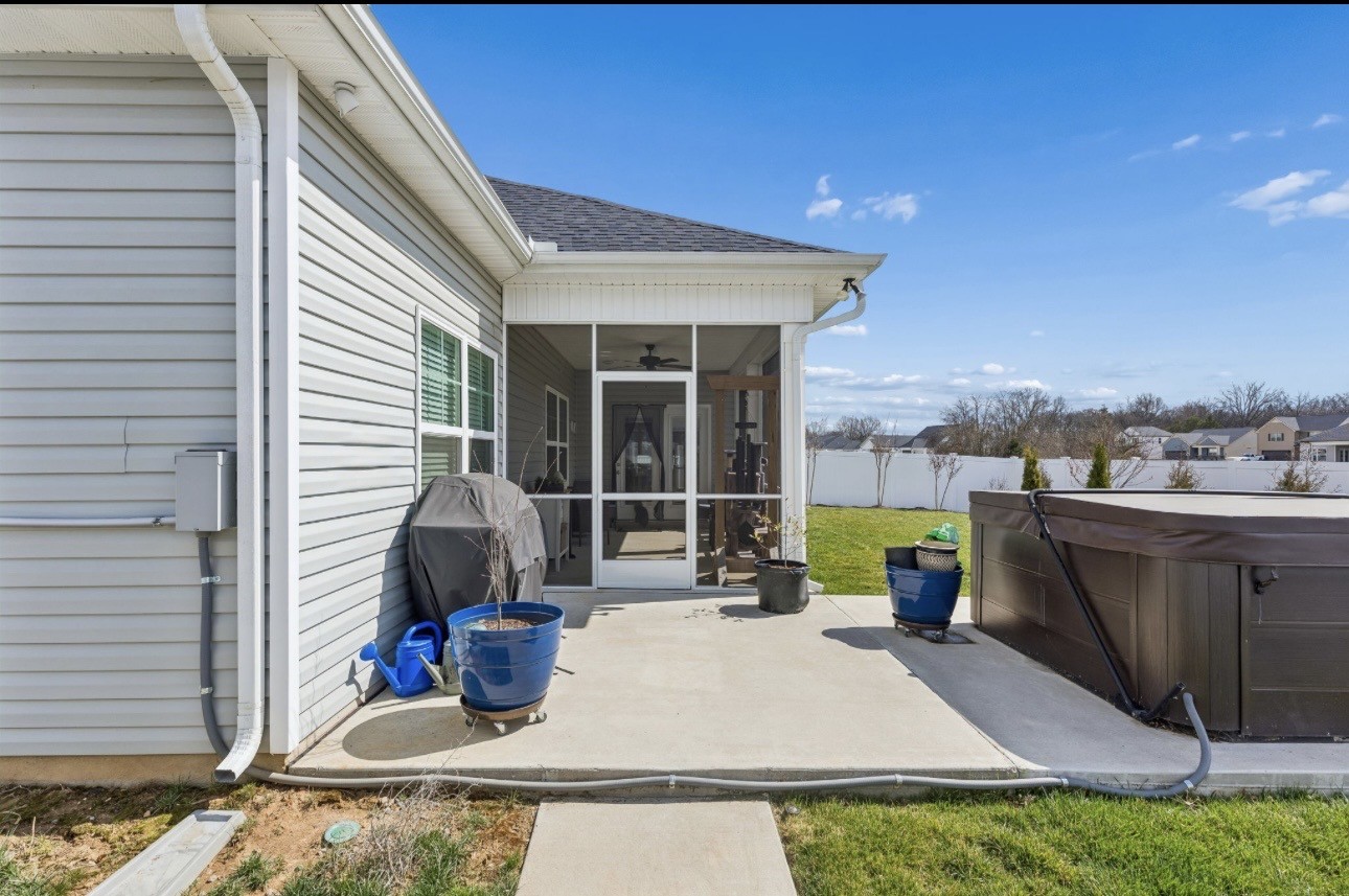 413 Ruby Cate Way Murfreesboro, TN 37128 - Photo 11 of 31 a view of a patio with table and chairs and potted plants