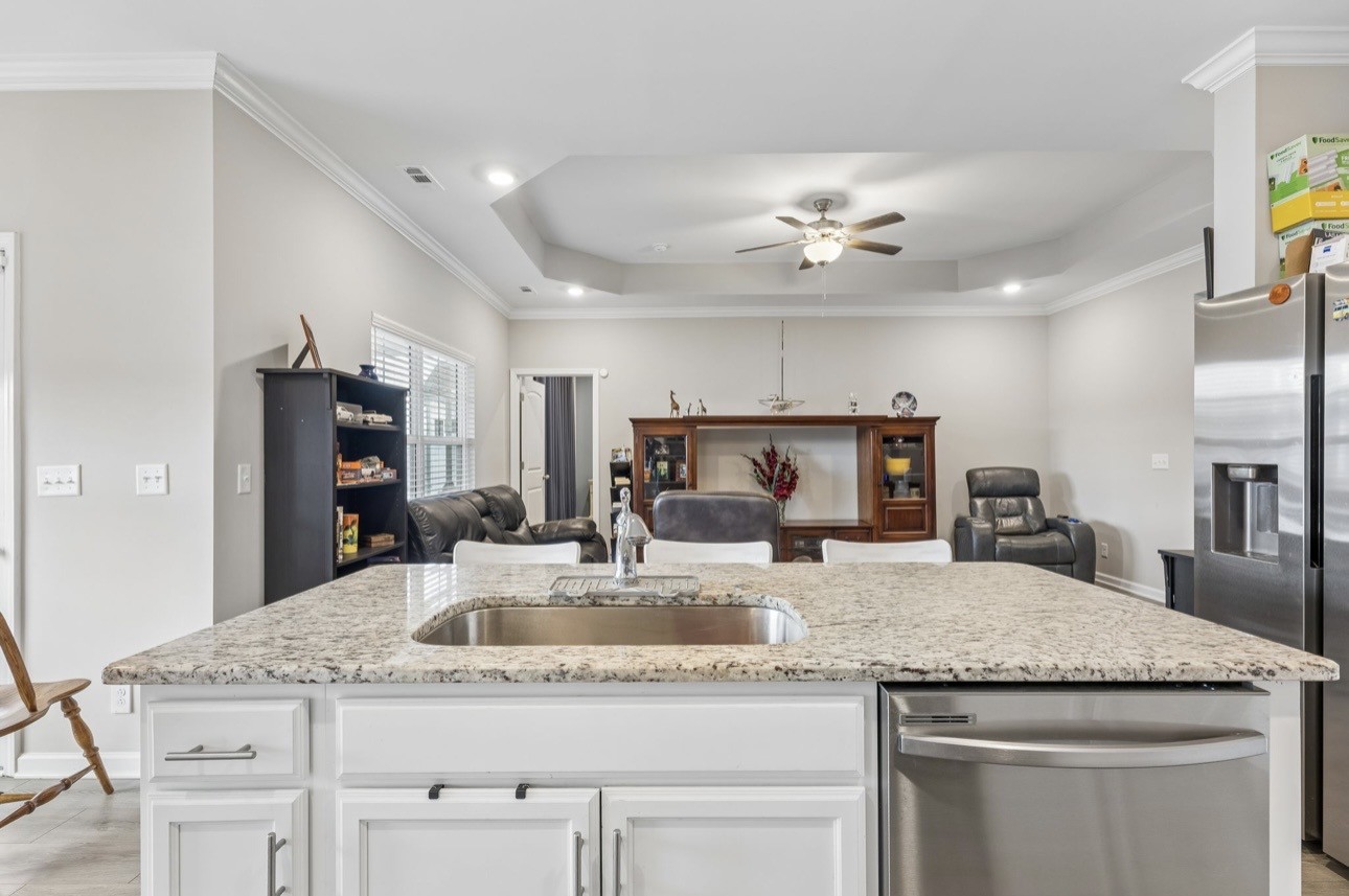413 Ruby Cate Way Murfreesboro, TN 37128 - Photo 17 of 31 a kitchen with kitchen island a sink stove and refrigerator