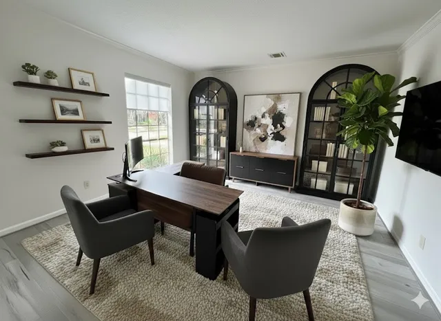 a living room with furniture a rug and a window