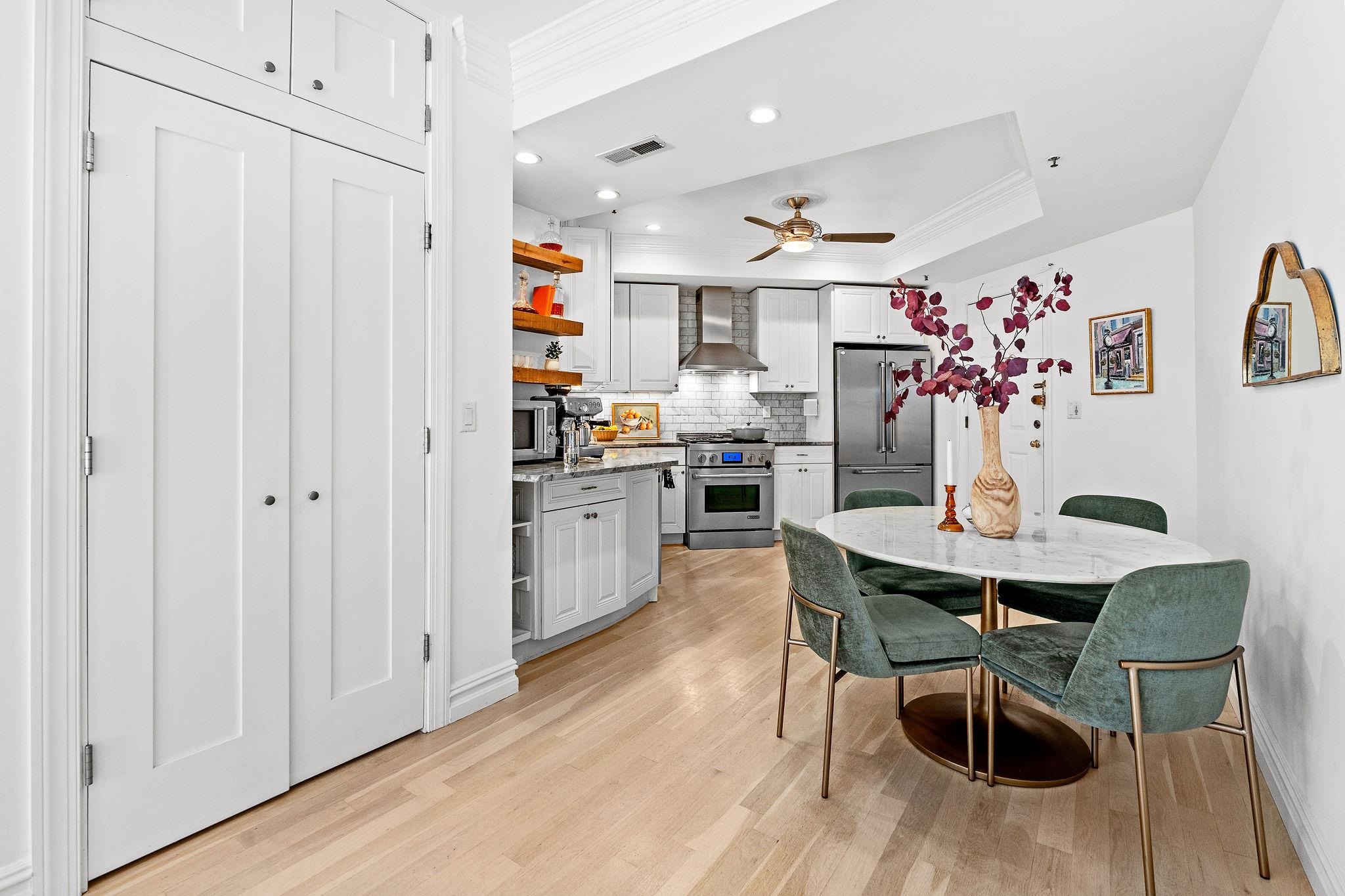 600 Hudson Street, Unit 2B Hoboken, NJ 07030 - Photo 5 of 20 a view of a dining room with furniture and wooden floor