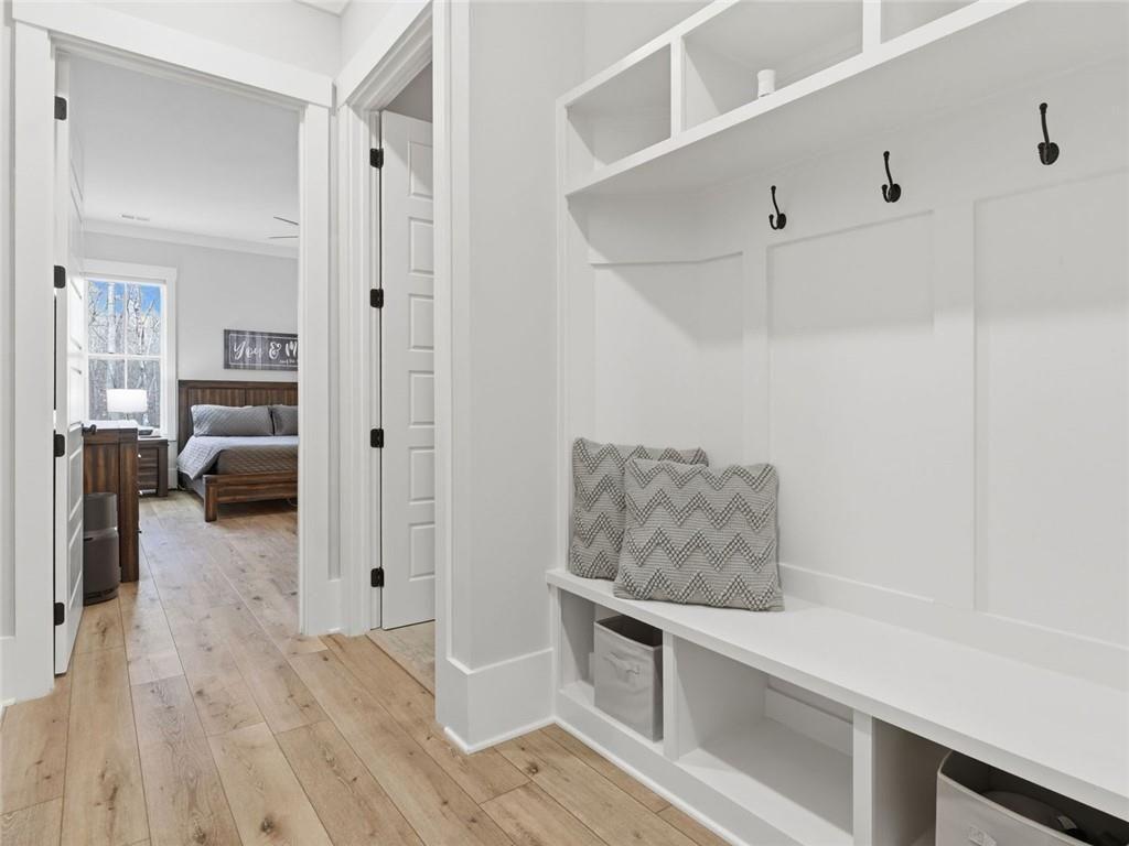 877 Arnold Mill Road Woodstock, GA 30188 - Photo 24 of 62 a view of room with furniture and wooden floor