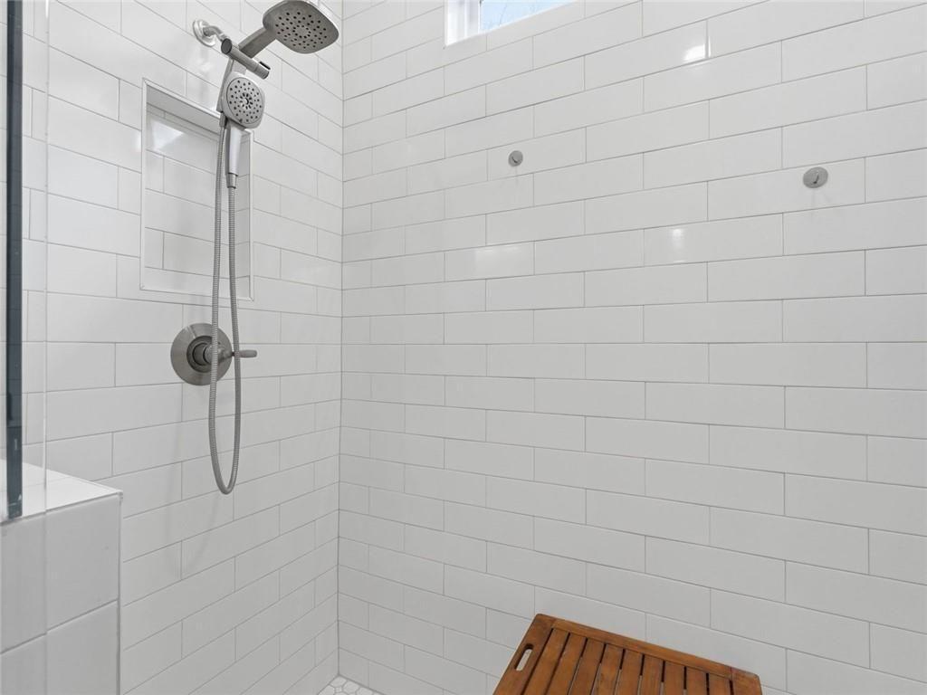 877 Arnold Mill Road Woodstock, GA 30188 - Photo 29 of 62 a bathroom with a shower