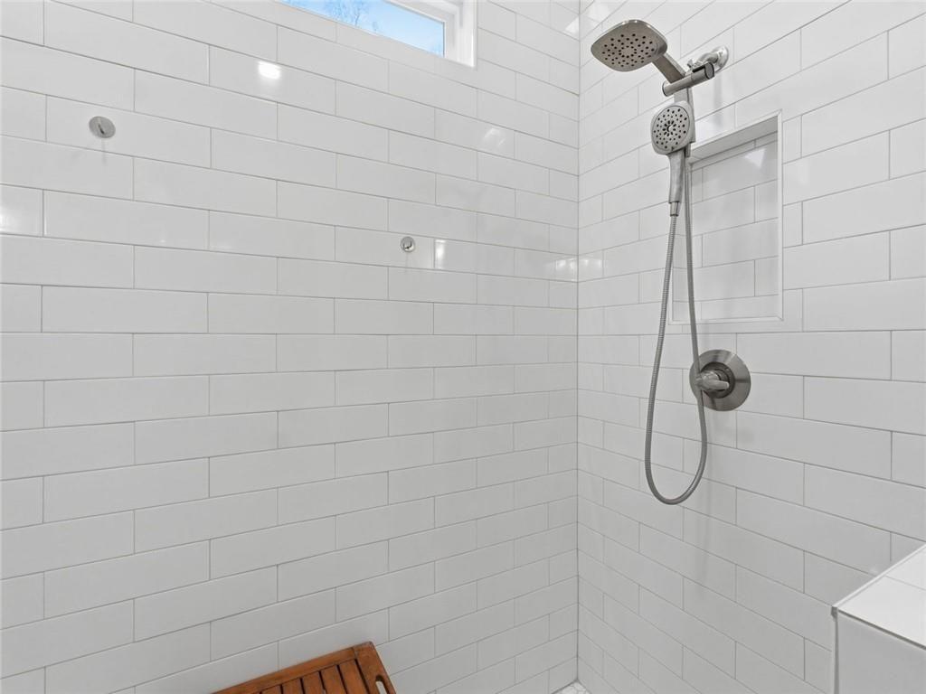 877 Arnold Mill Road Woodstock, GA 30188 - Photo 30 of 62 a bathroom with a shower