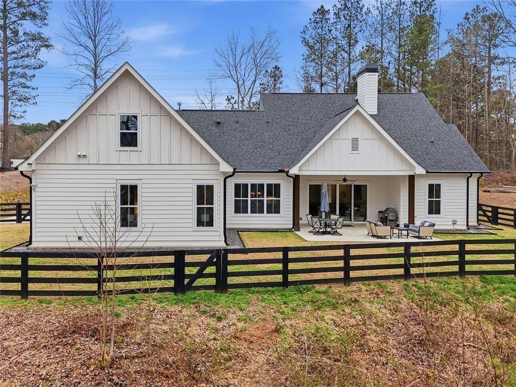 877 Arnold Mill Road Woodstock, GA 30188 - Photo 52 of 62 a front view of a house with a yard