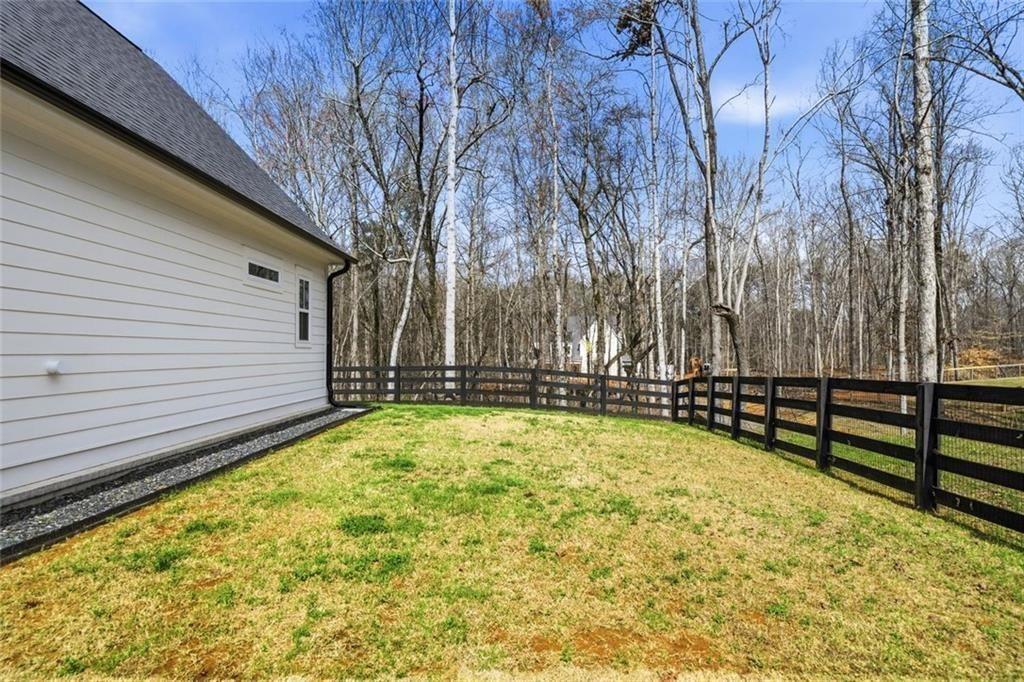 877 Arnold Mill Road Woodstock, GA 30188 - Photo 55 of 62 a view of back yard of the house