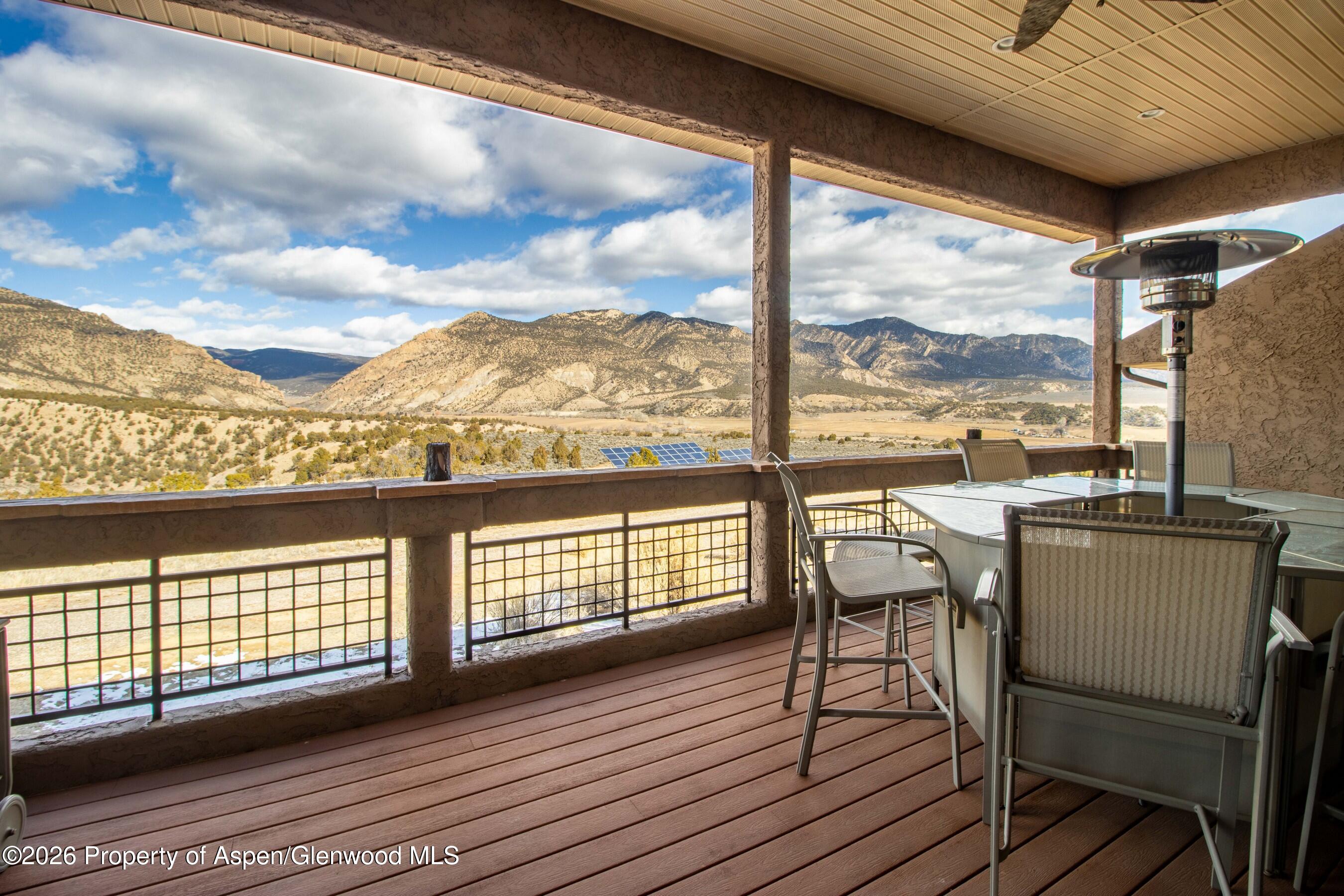 966 Mesa Drive Rifle, CO 81650 - Photo 16 of 54 a view of a balcony with wooden floor