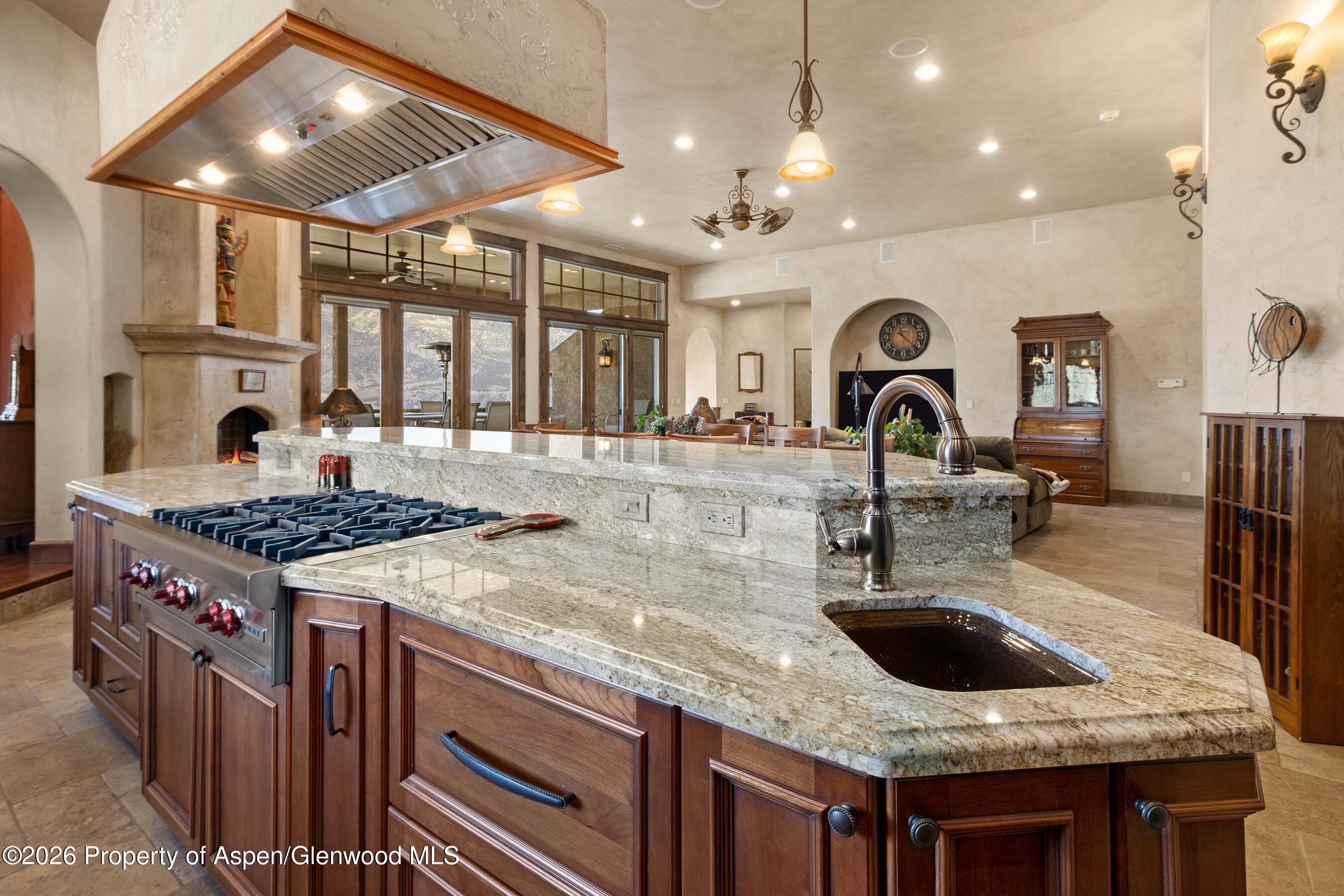 966 Mesa Drive Rifle, CO 81650 - Photo 19 of 54 a kitchen with a stove and a sink