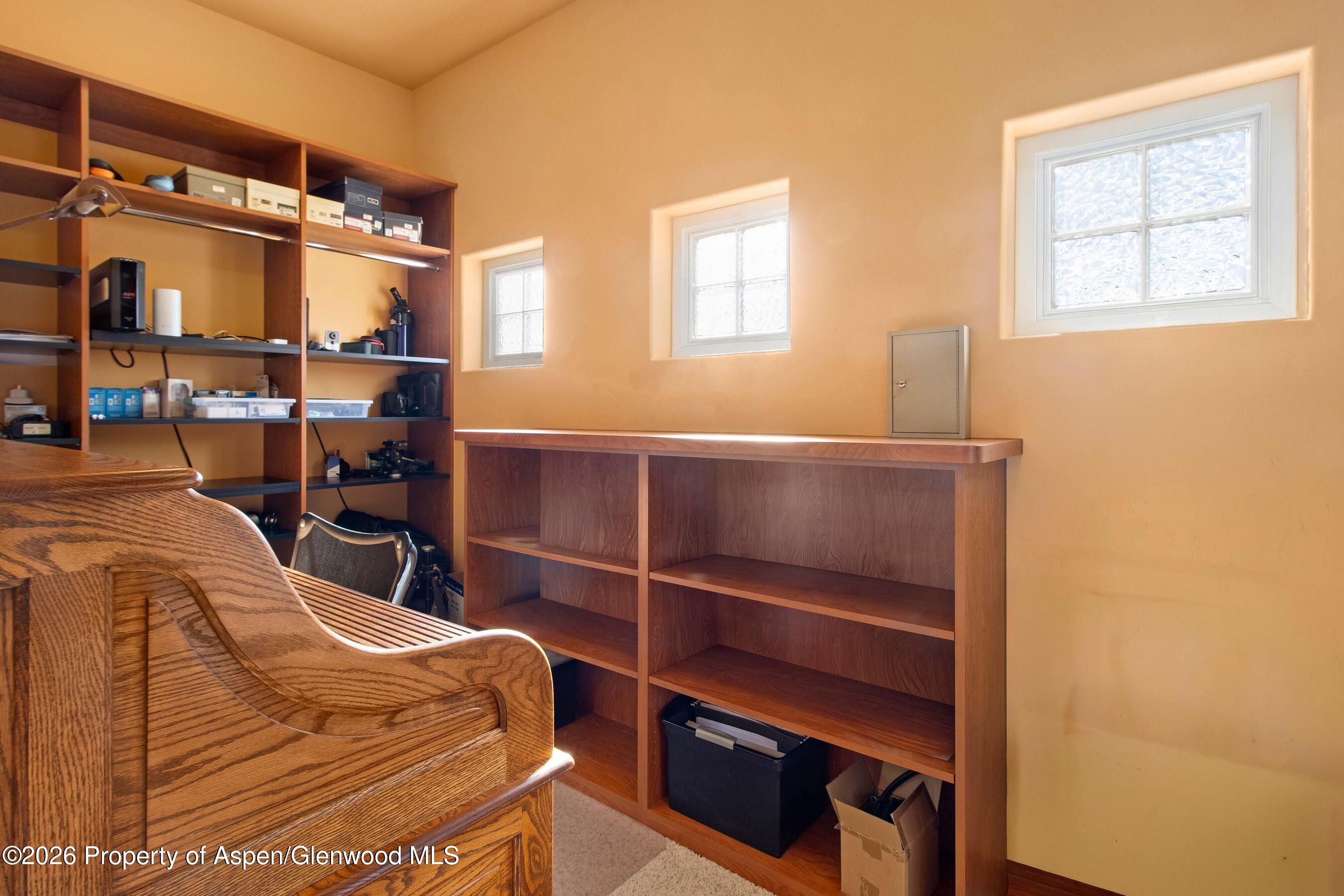 966 Mesa Drive Rifle, CO 81650 - Photo 34 of 54 a bedroom with a bed and a window