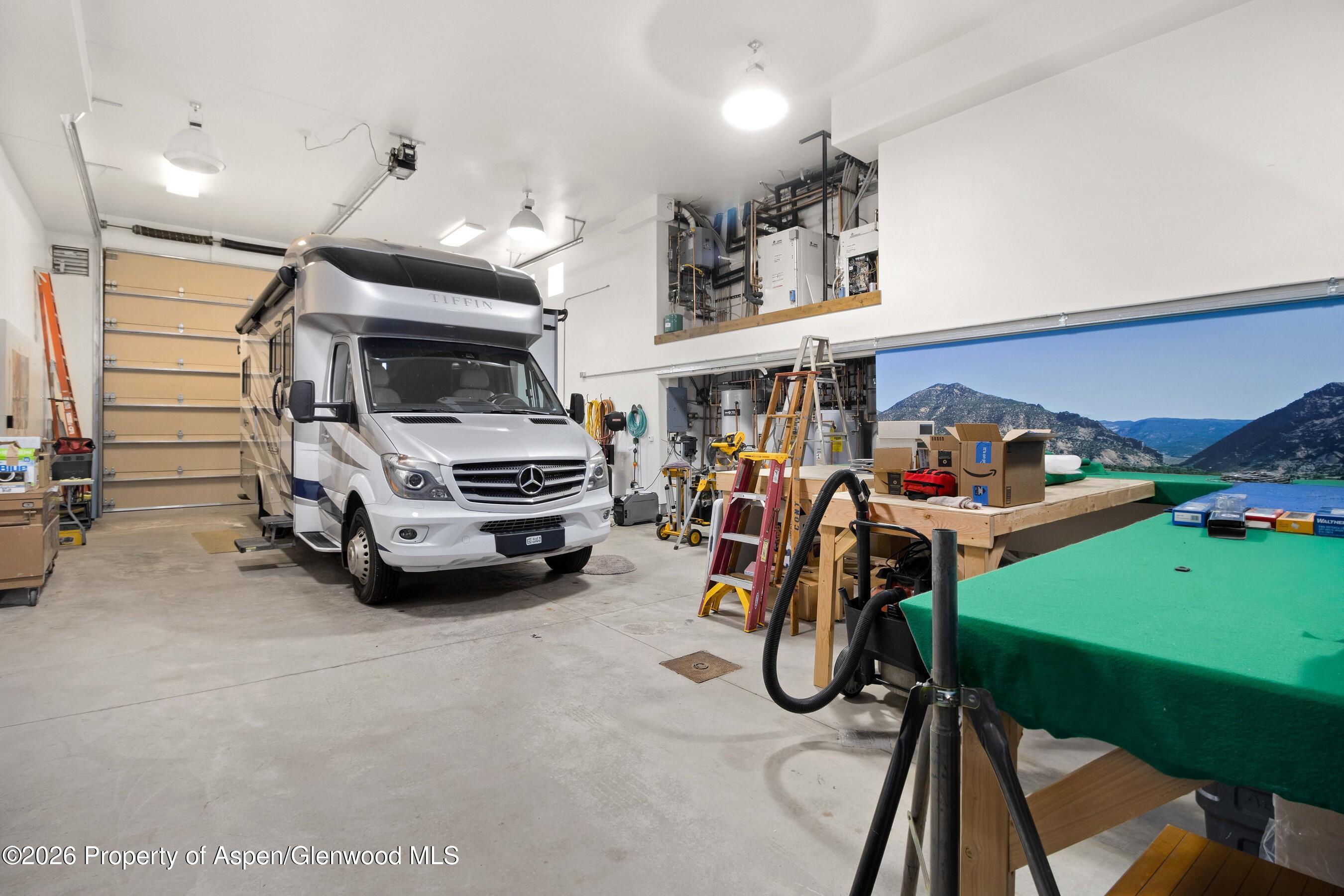 966 Mesa Drive Rifle, CO 81650 - Photo 49 of 54 a view of a room with gym equipment