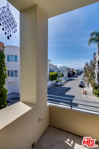 a view of a balcony with an outdoor space