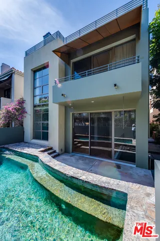 a house view with a garden space