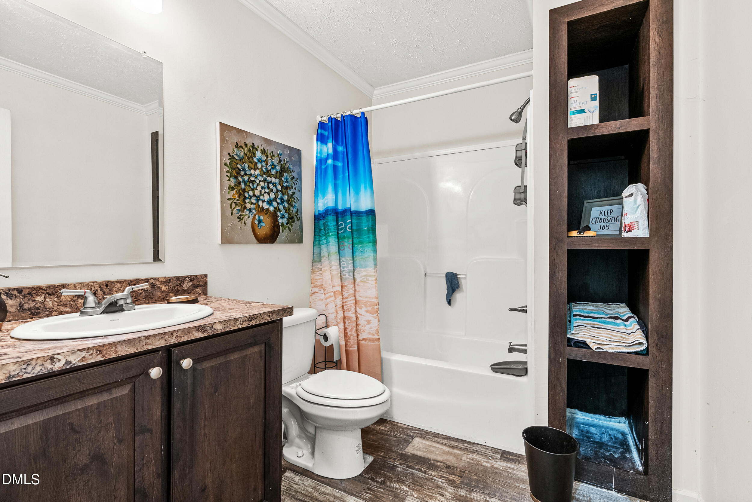 883 Low Ground Road Enfield, NC 27823 - Photo 18 of 26 a bathroom with a sink toilet and shower