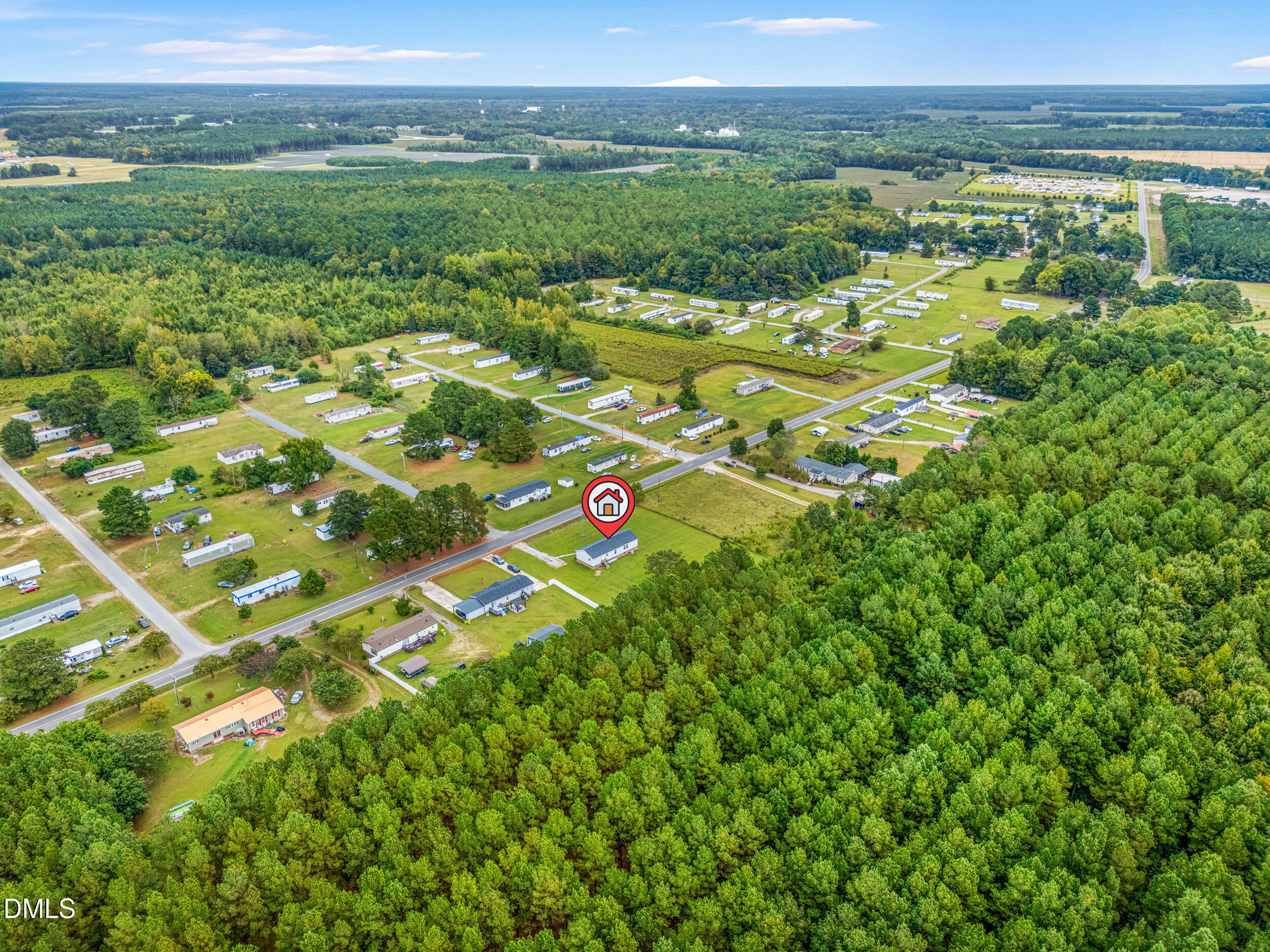 883 Low Ground Road Enfield, NC 27823 - Photo 25 of 26 a view of a city with lush green forest