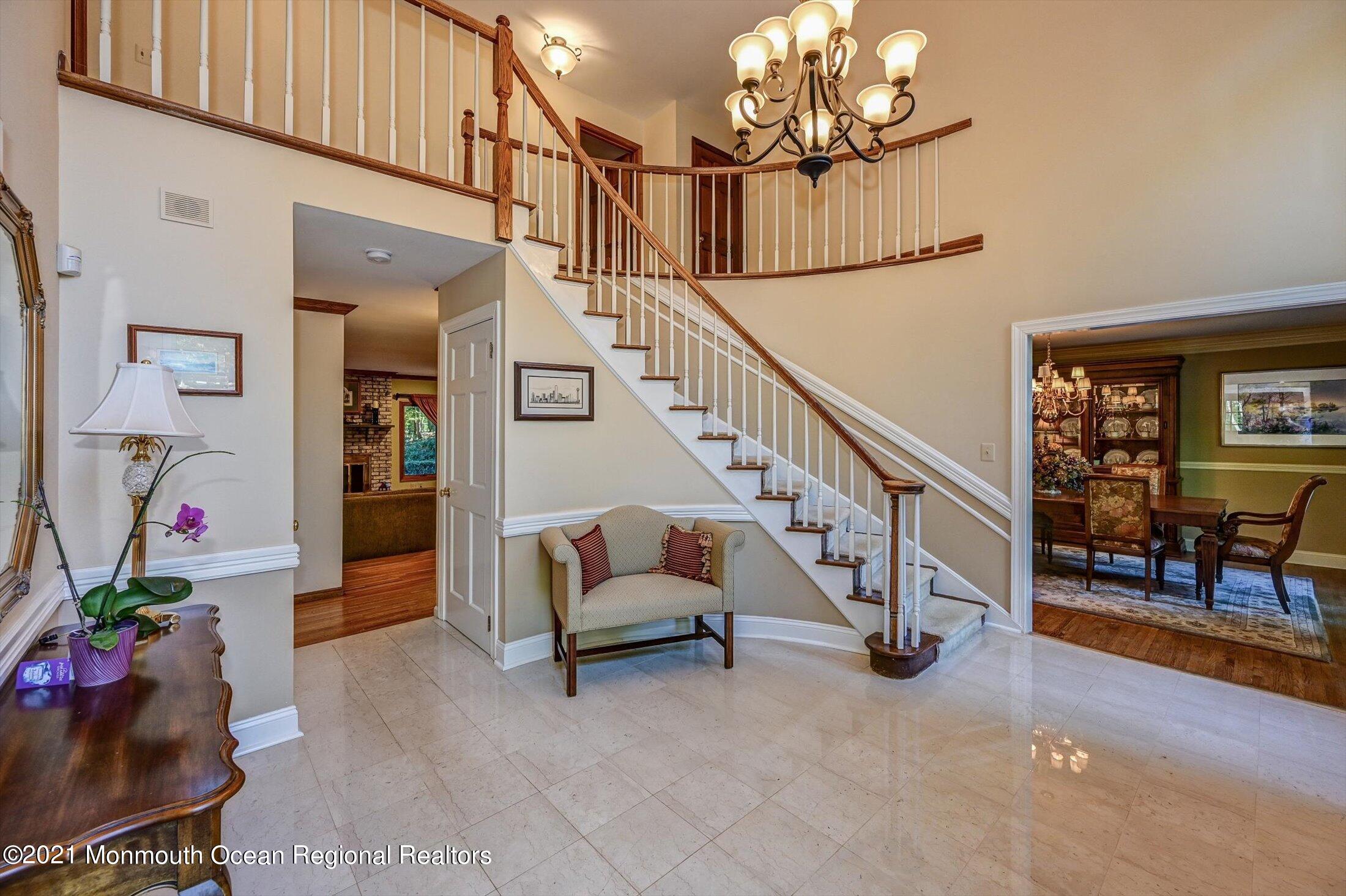 10 Crowfield Lane Holmdel, NJ 07733 - Photo 2 of 52 a view of entryway and workspace