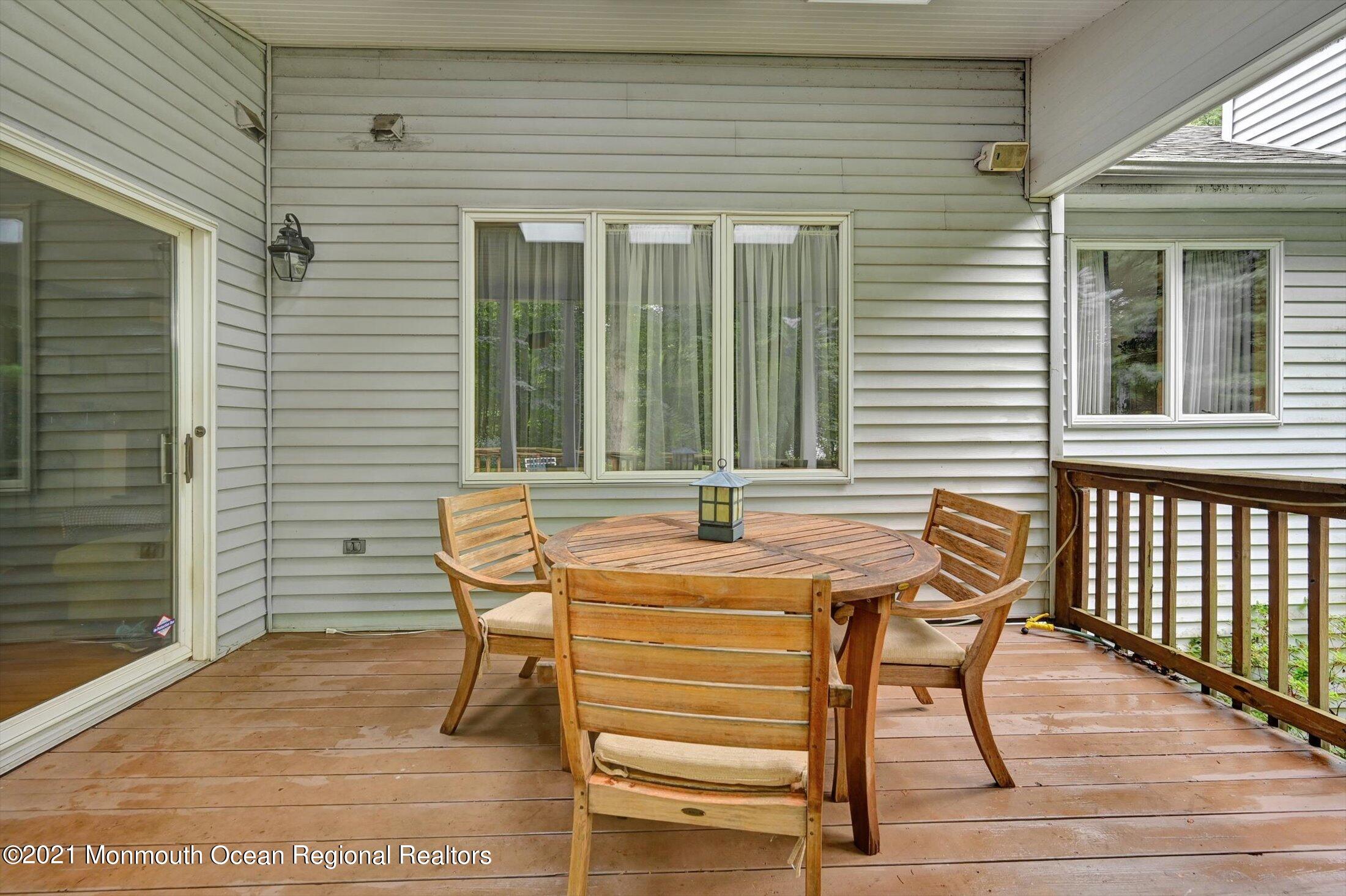 10 Crowfield Lane Holmdel, NJ 07733 - Photo 37 of 52 a living room with furniture and a couch