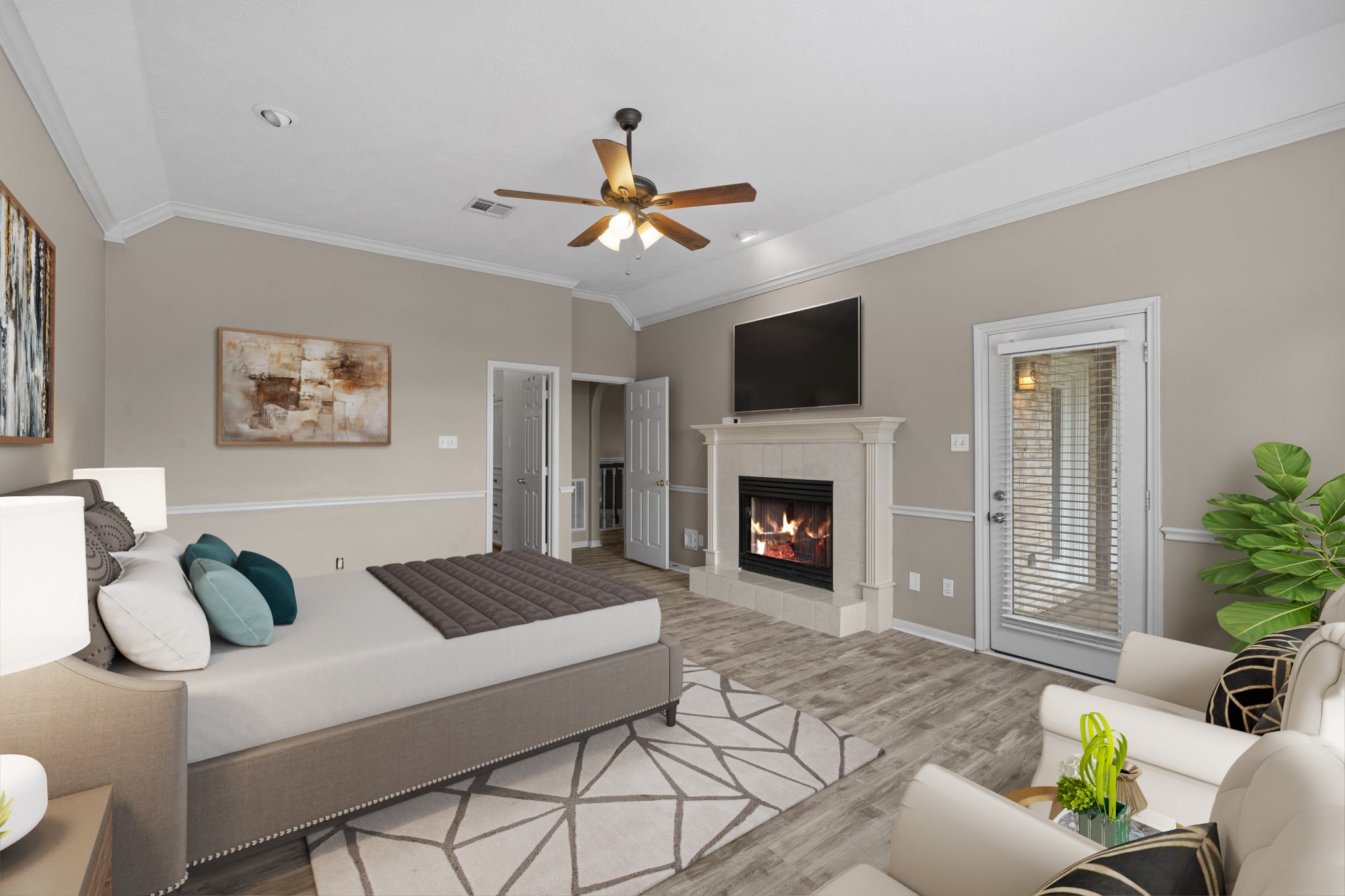 169 April Cove Montgomery, TX 77356 - Photo 11 of 39 Virtually Staged: Unwind after a long day in this incredibly spacious master suite. Featuring high ceilings, elegant crown molding, tile floors, a ceiling fan, and recessed lighting.