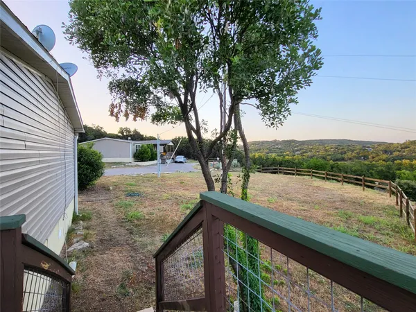 a view of a balcony with lake view