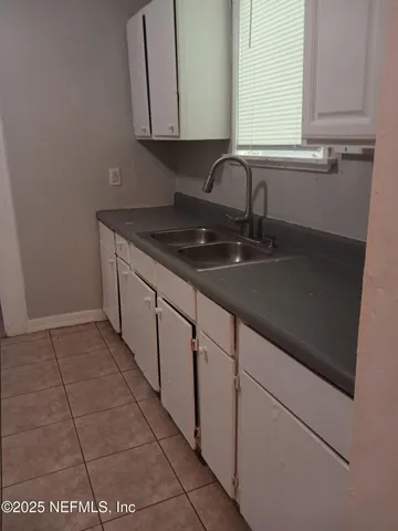 a view of a room with an empty space