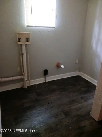 a bathroom with a bathtub and a sink