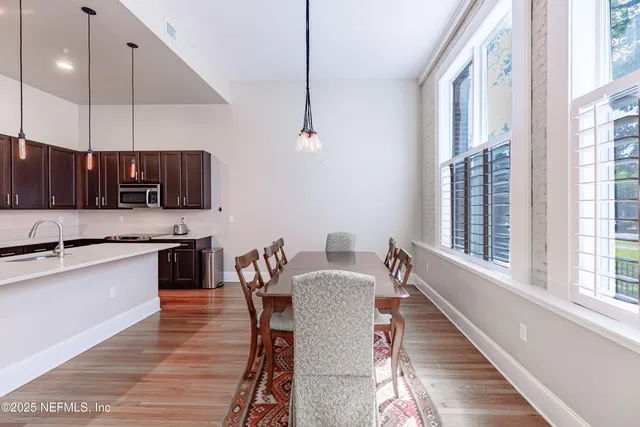 a view of kitchen with sink and microwave