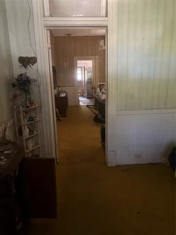 a view of a room that has a bench in it