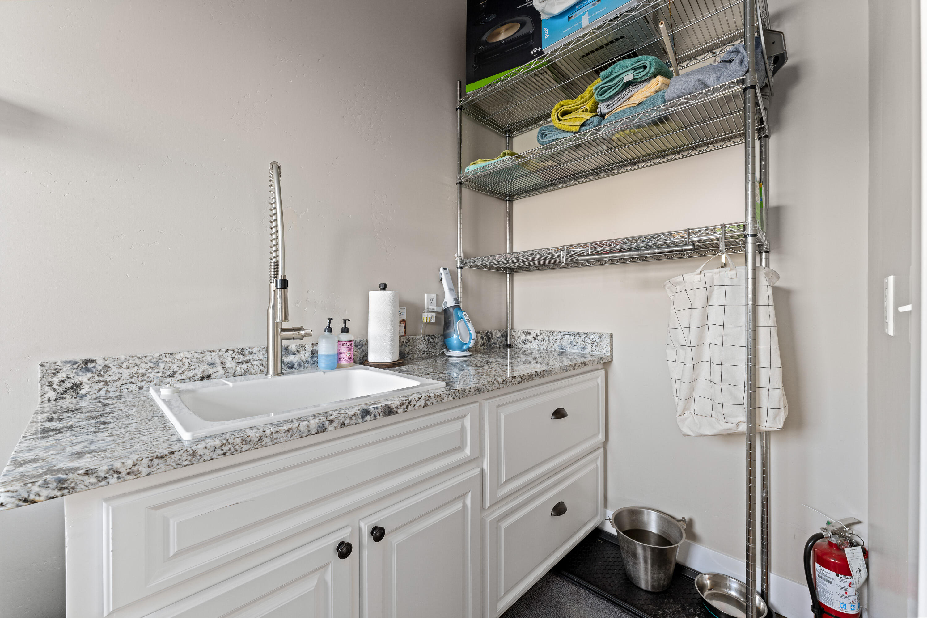 995 Suncrest Road Talent, OR 97540 - Photo 35 of 96 a bathroom with a sink and a mirror