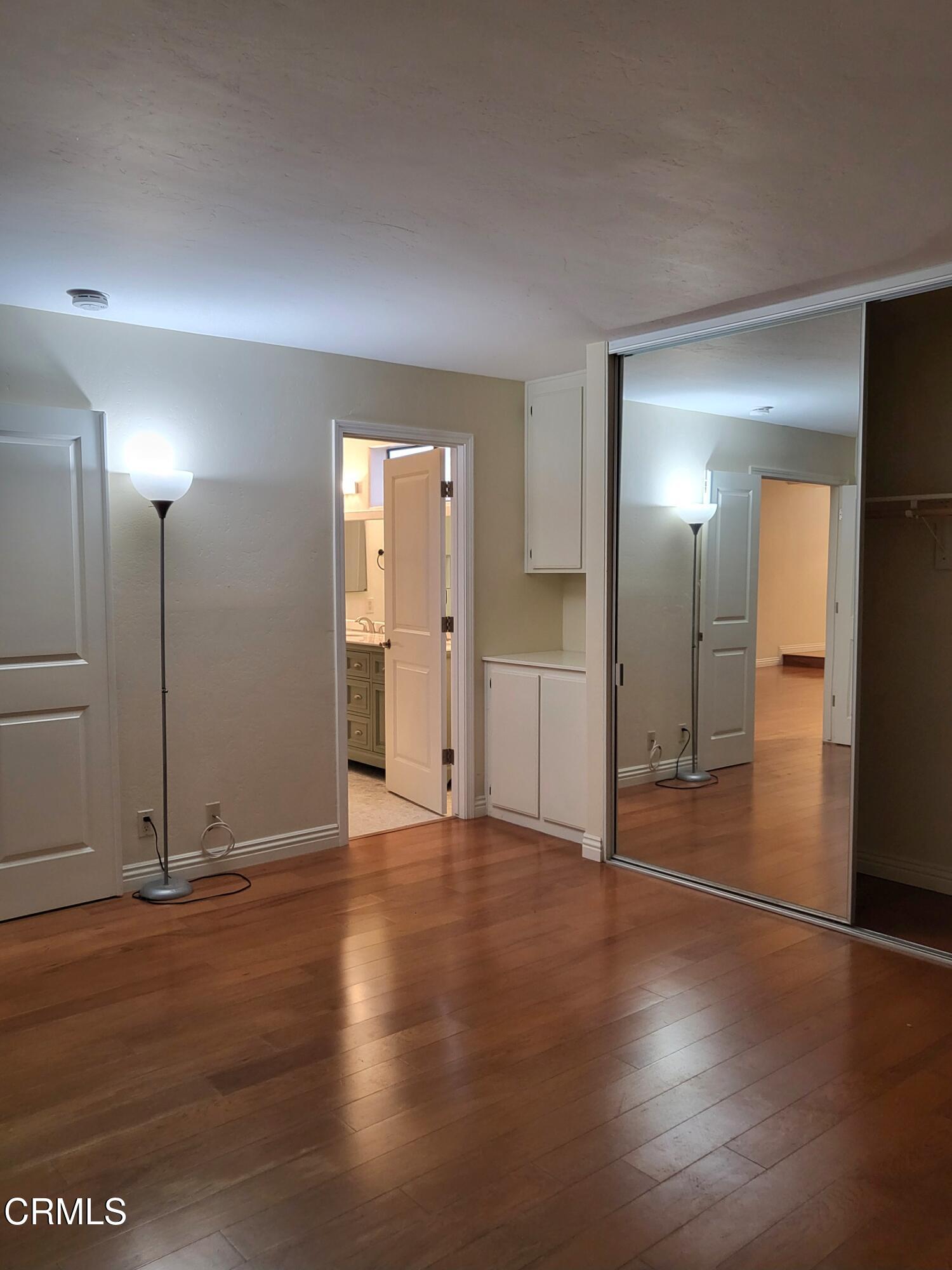 3701 Via Pacifica Walk Oxnard, CA 93035 - Photo 12 of 49 a view of a livingroom with wooden floor