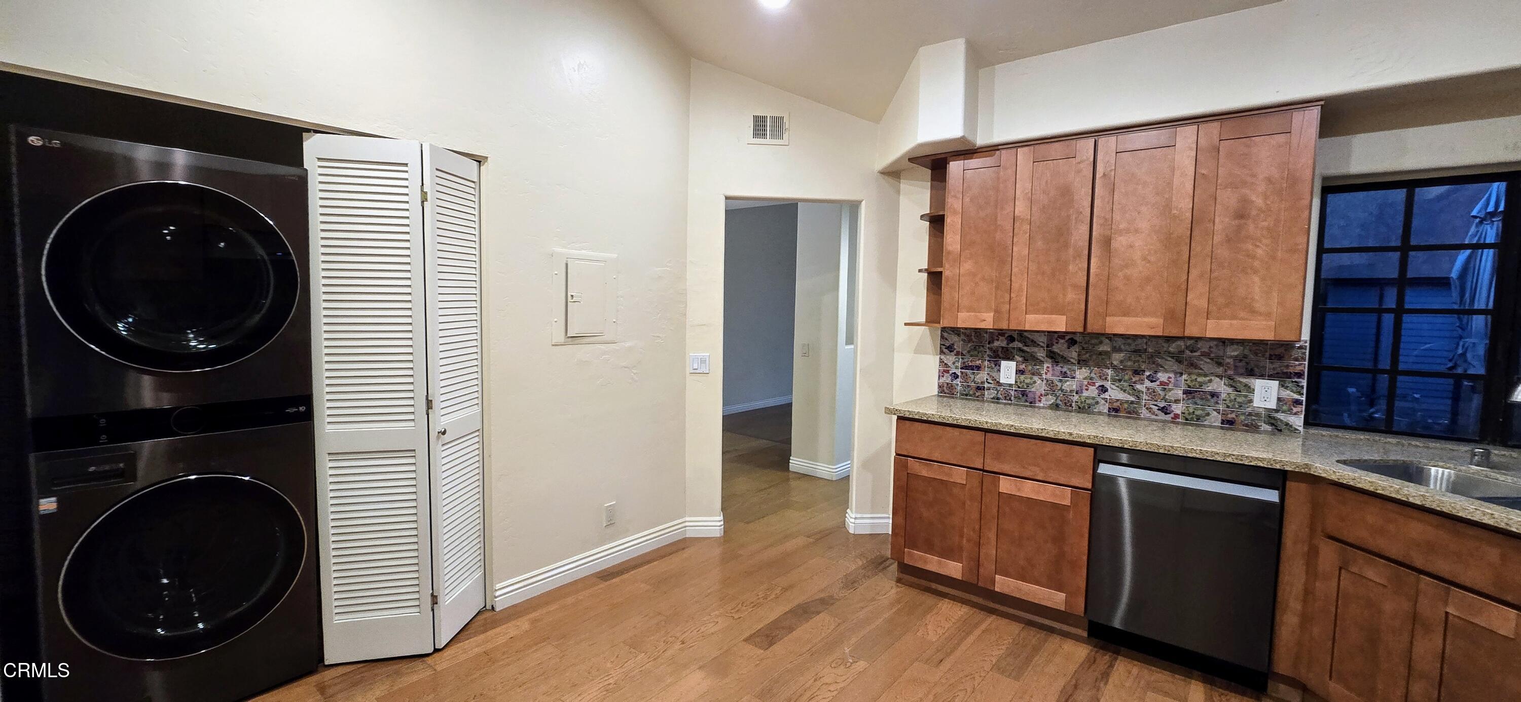 3701 Via Pacifica Walk Oxnard, CA 93035 - Photo 19 of 49 a view of a kitchen with washer and dryer