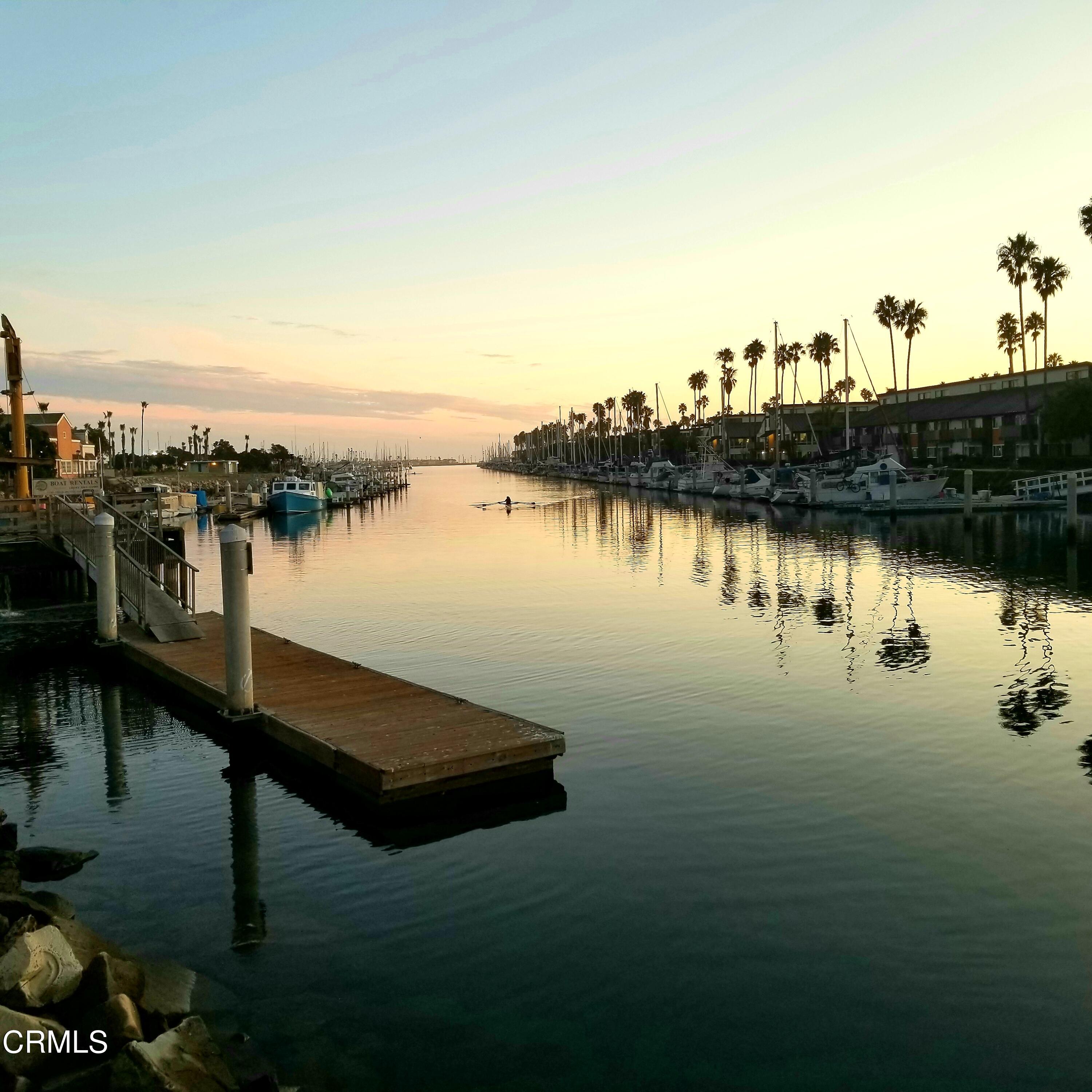 3701 Via Pacifica Walk Oxnard, CA 93035 - Photo 37 of 49 a view of a lake with houses with outdoor space