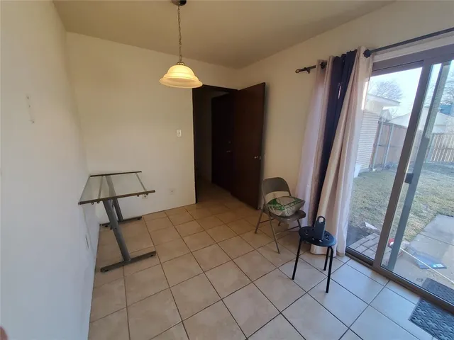 a room with furniture and a window