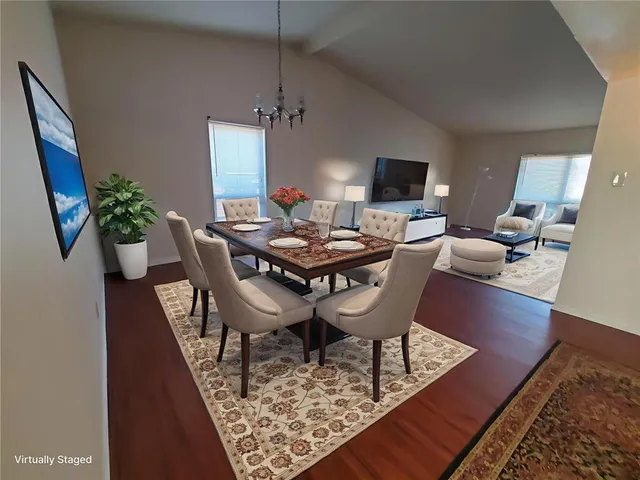 a view of a dining room with furniture