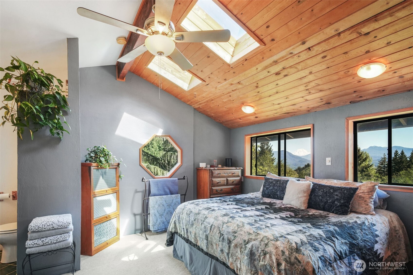 289 Long And Winding Road Randle, WA 98377 - Photo 21 of 40 a bedroom with a bed dresser and a large window