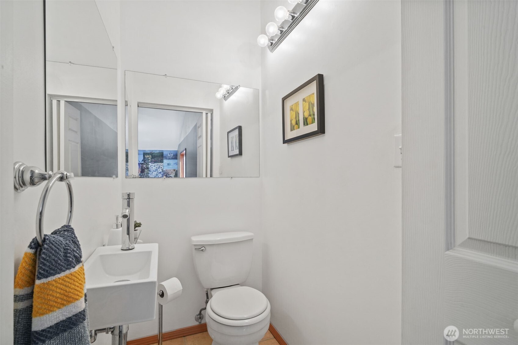 289 Long And Winding Road Randle, WA 98377 - Photo 31 of 40 a bathroom with a toilet a sink and mirror