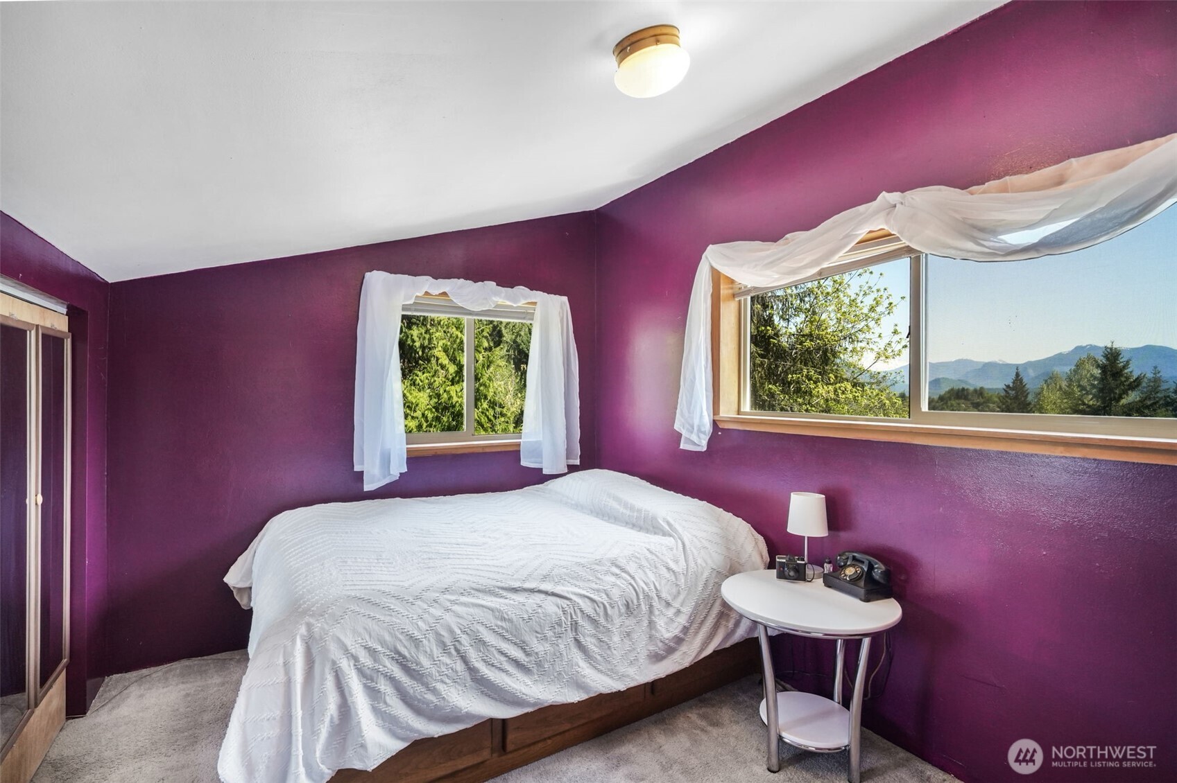 289 Long And Winding Road Randle, WA 98377 - Photo 32 of 40 a bedroom with a bed and a window