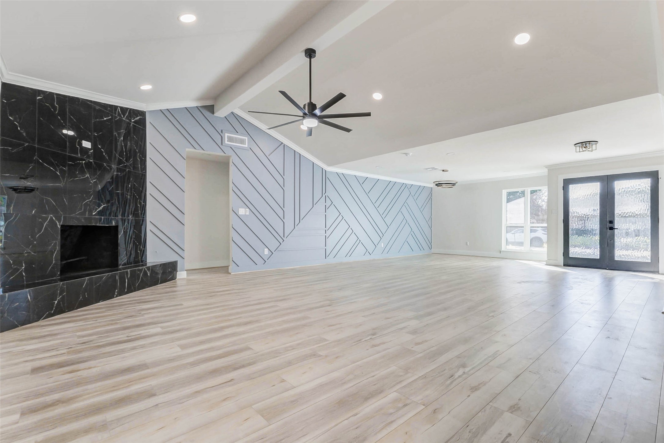 6106 Rutherglenn Drive Houston, TX 77096 - Photo 12 of 43 wooden floor in an empty room with a fireplace