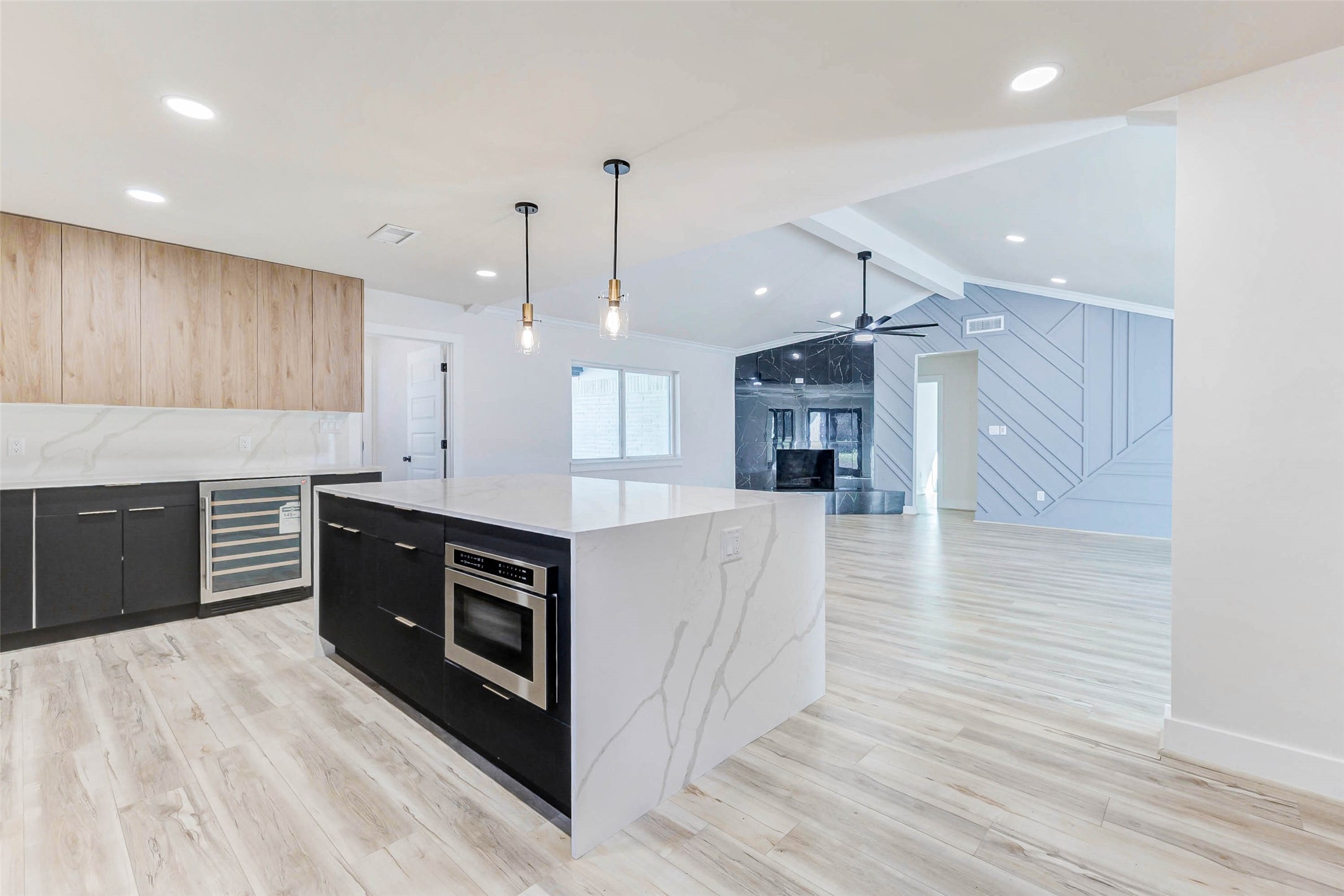 6106 Rutherglenn Drive Houston, TX 77096 - Photo 17 of 43 a kitchen with stainless steel appliances kitchen island granite countertop a stove a sink and a refrigerator