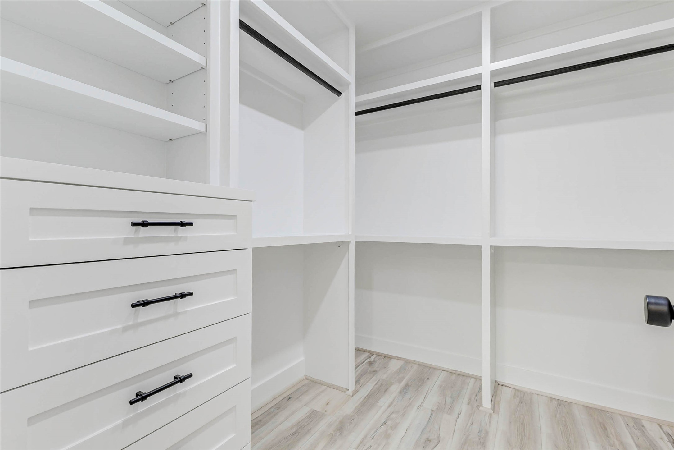 6106 Rutherglenn Drive Houston, TX 77096 - Photo 29 of 43 a view of an empty walk in closet