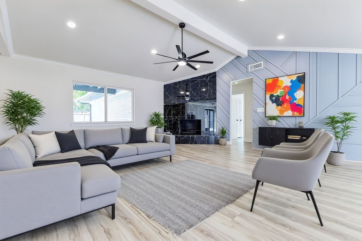 6106 Rutherglenn Drive Houston, TX 77096 - Photo 3 of 43 a living room with furniture a fireplace and a flat screen tv