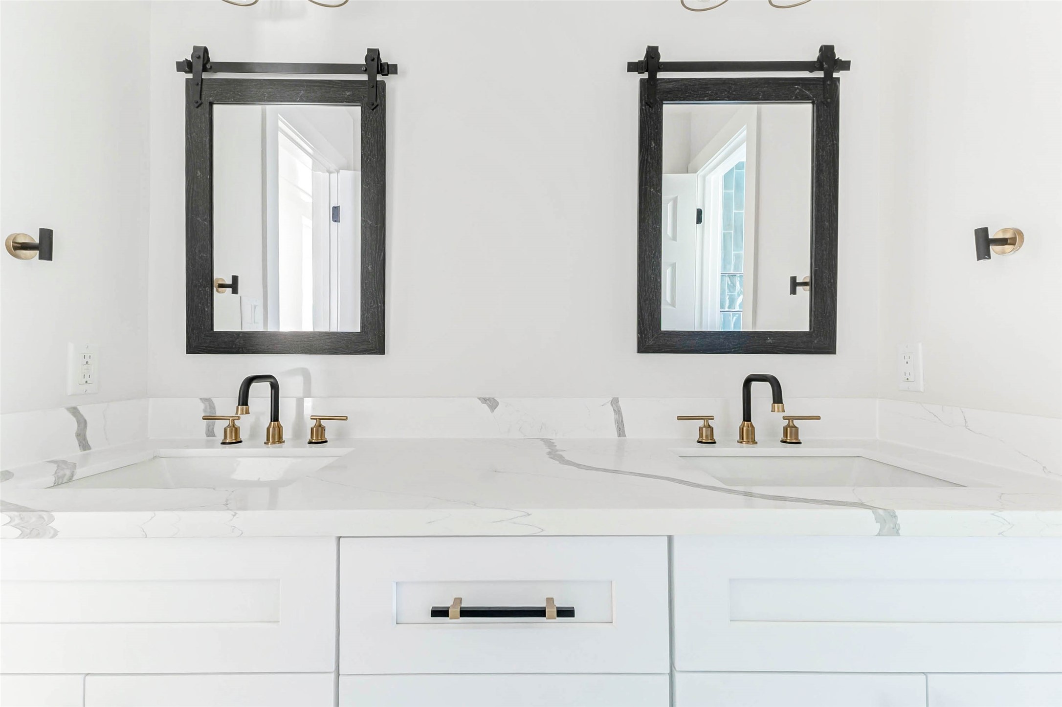 6106 Rutherglenn Drive Houston, TX 77096 - Photo 38 of 43 a bathroom with a sink vanity and mirror