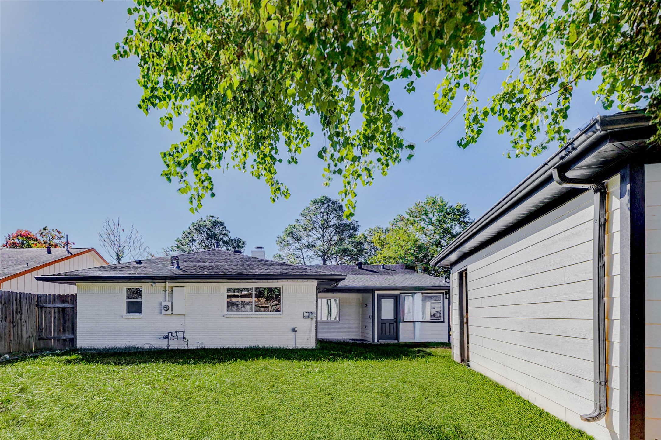 6106 Rutherglenn Drive Houston, TX 77096 - Photo 40 of 43 a view of a house with a garden