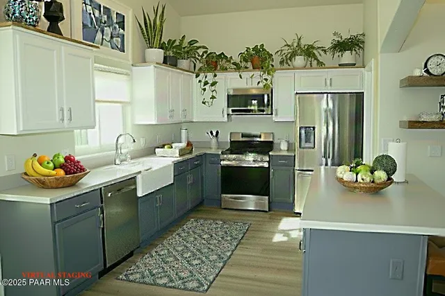 a spacious bedroom with a bed and a window