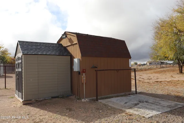 a house with trees in front of it