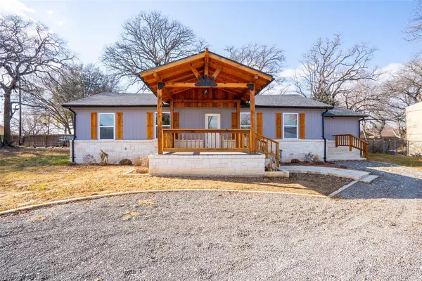 a front view of house with yard