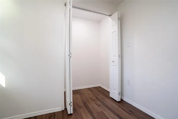 a view of small space with wooden floor