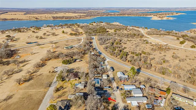 an aerial view of residential building and parking space