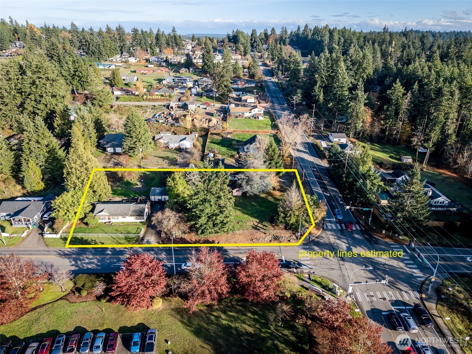 1998 Northwest Bucklin Hill Road Silverdale, WA 98383 - Photo 8 of 17 an aerial view of residential houses with outdoor space