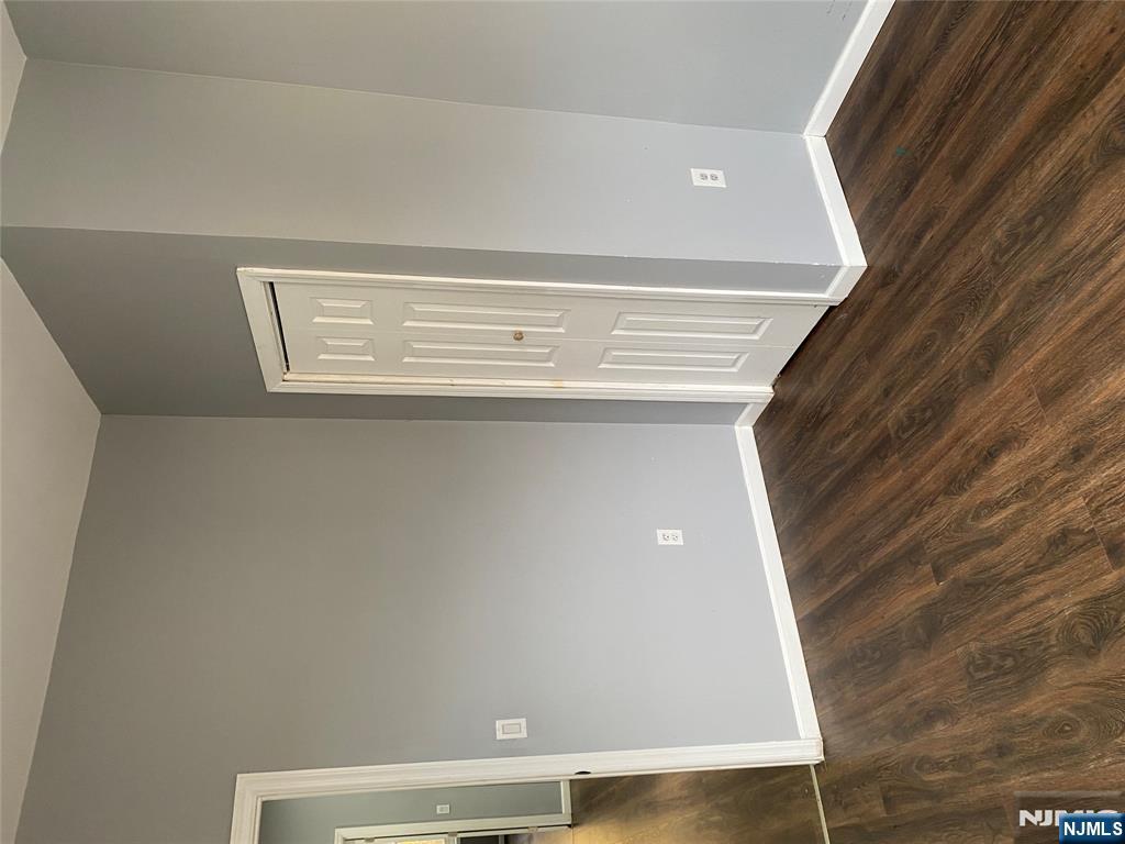 540 South 20th Street, Unit 2 Newark, NJ 07103 - Photo 11 of 13 an empty room with wooden floor and closet