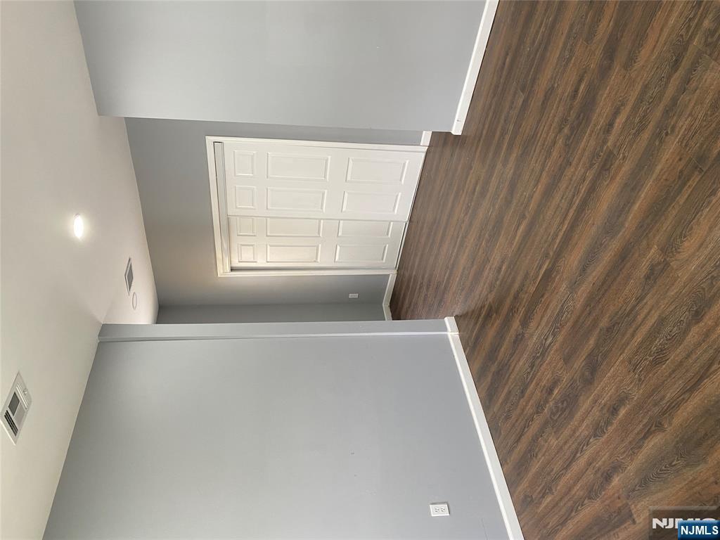 540 South 20th Street, Unit 2 Newark, NJ 07103 - Photo 13 of 13 a view of an empty room with wooden floor